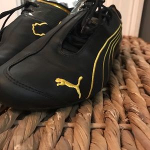 Leather Puma shoes.